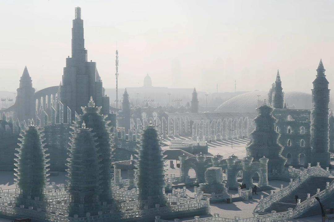 Ice sculptures are seen during daylight at the annual ice festival in Harbin on January 7, 2019. The Atlantic.