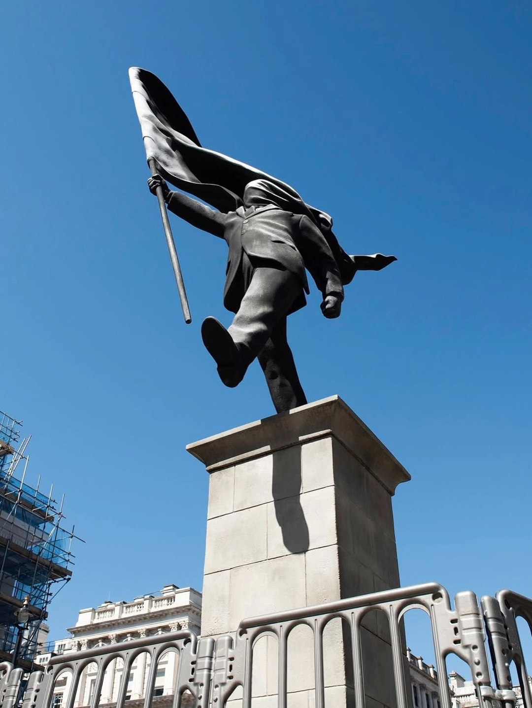 The flag carries no colour, no identifiable symbols.