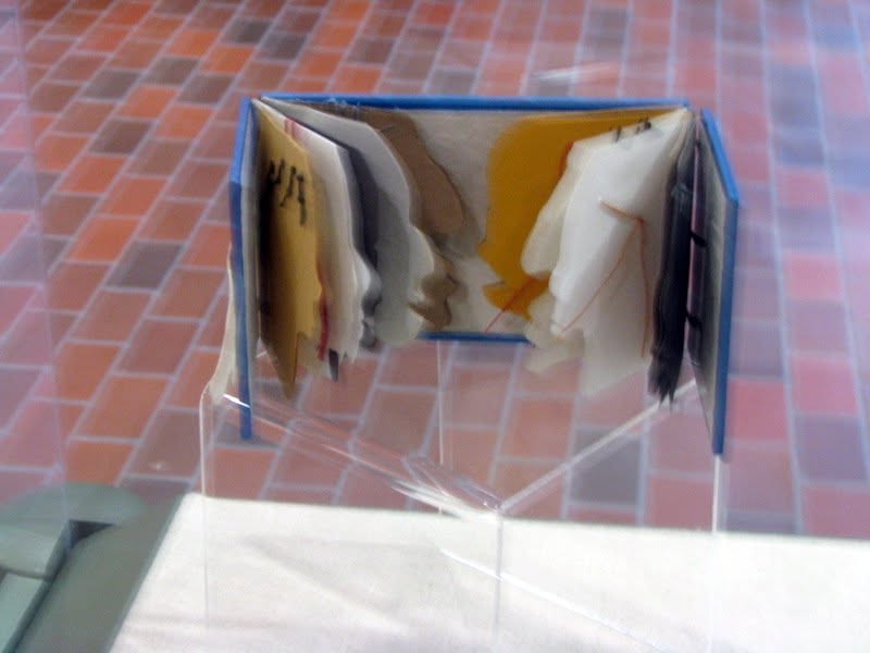 Sculptural artist’s book with suspended handmade-paper leaves and painted covers, exhibited in Bookworks 12, Cincinnati, 2011.
