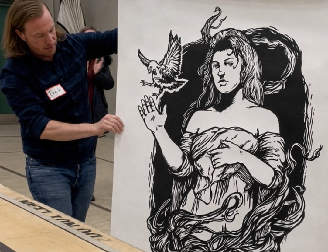 Fred Daniell with his super-sized print at the Big Ink event in the Dunham Recreation gym.