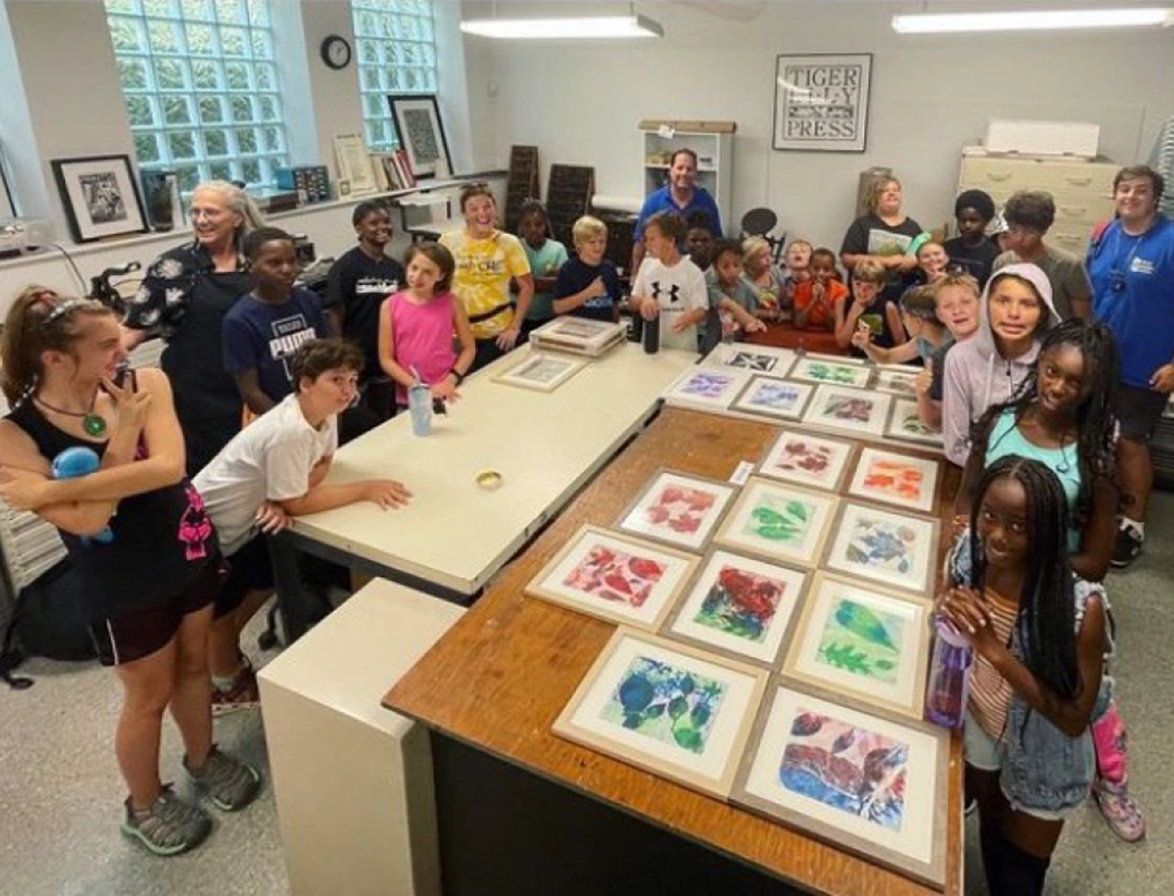 Dunham Summer Camp kids learn about printmaking at Tiger Lily Press.