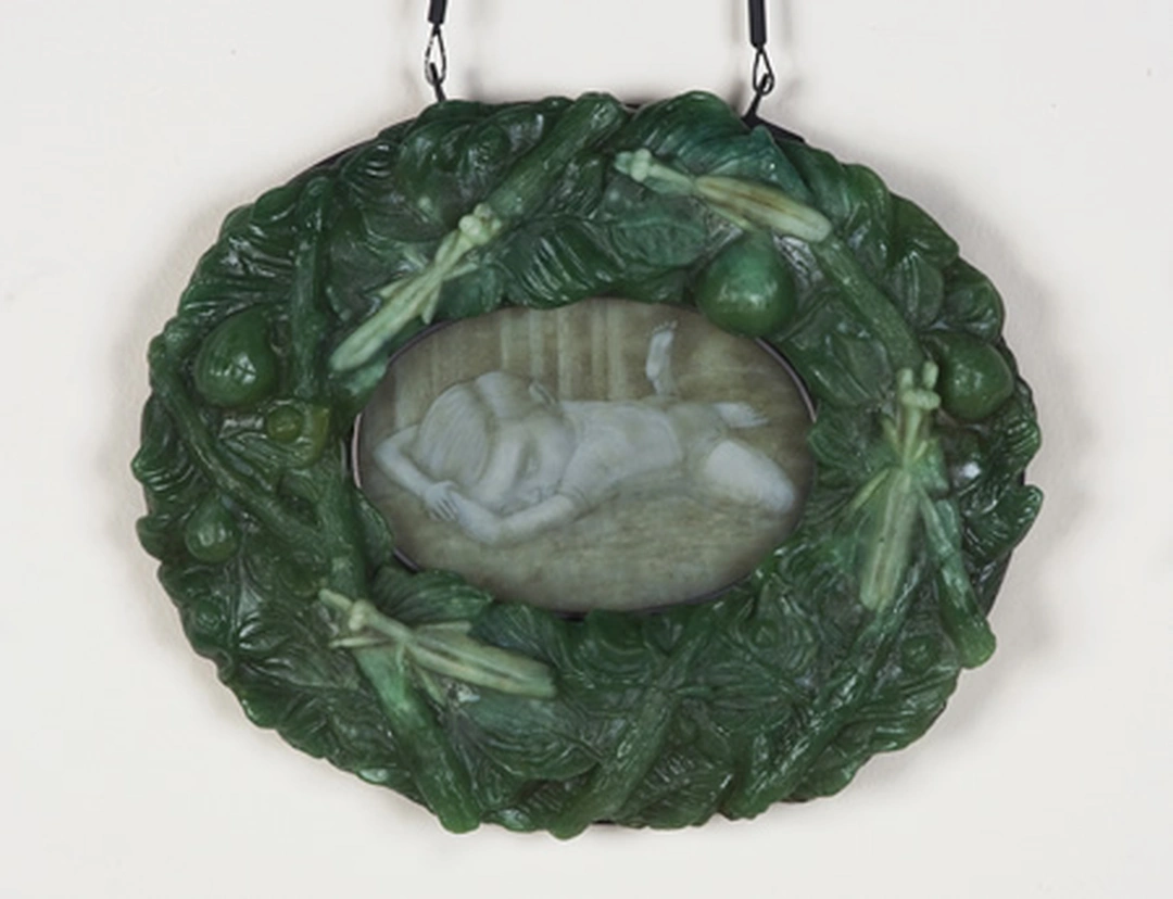 Steven Ramsey. Naughty Boy (2011). Pâte de verre, enameled glass, lead, and steel. 10” x 8” x 1.5”. Photo courtesy of Marta Hewett Gallery.