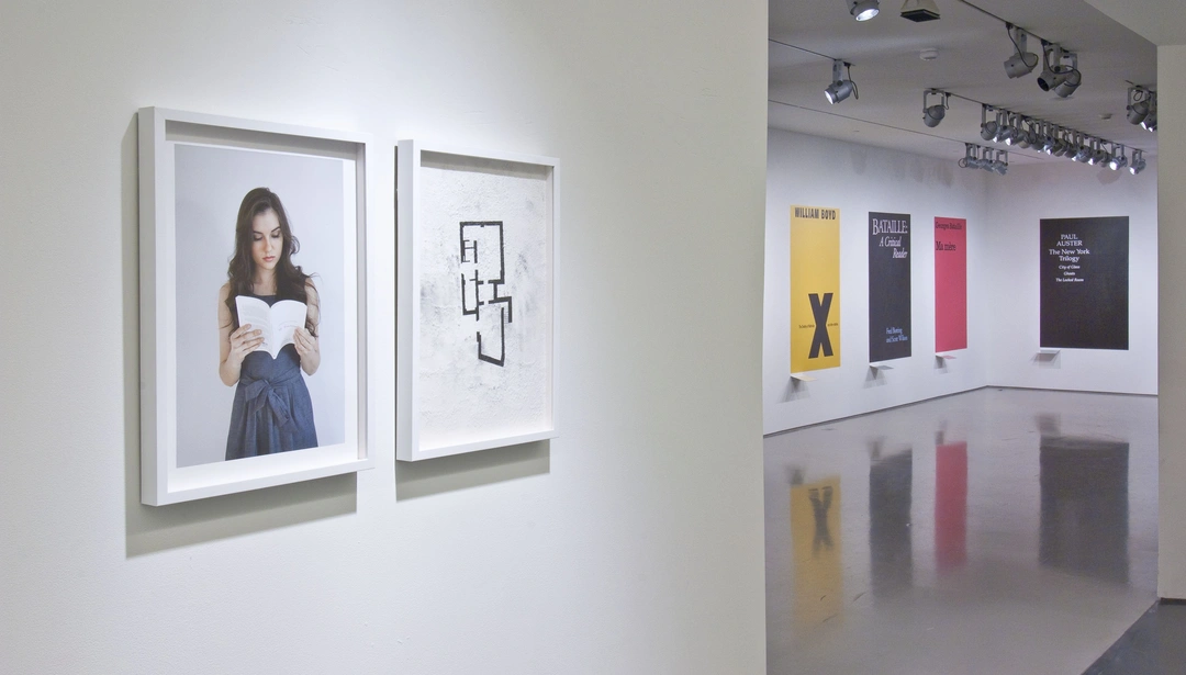 Julião Sarmento, portrait of Sasha Grey reading and architectural drawing, installation view at the Contemporary Arts Center, Cincinnati, 2011.