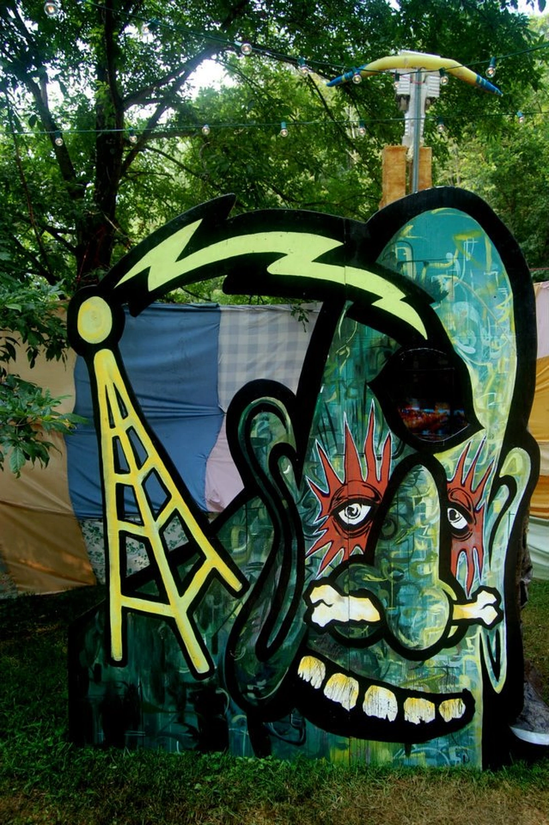 Bunk News, outdoor painted wooden sculpture installation. Photo by Michael Englender.