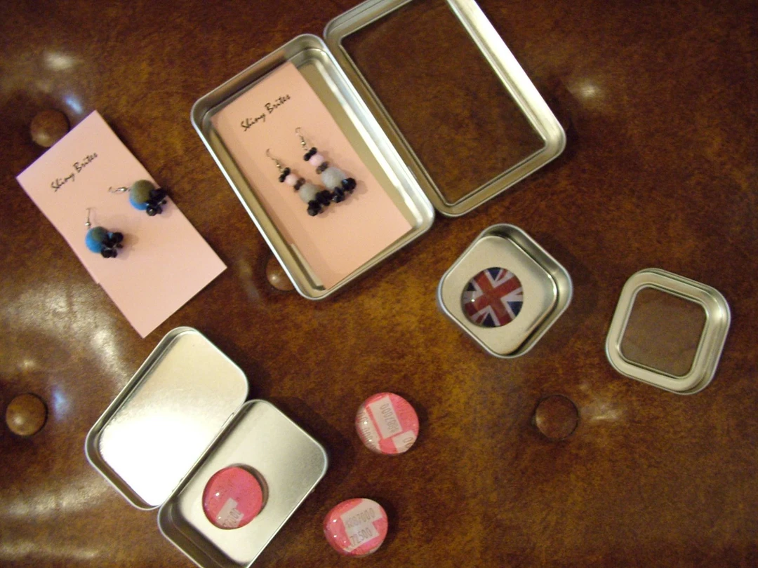 Handcrafted jewelry in tins and gift-art creations exhibited at 1305 Gallery's annual Yuletide show.