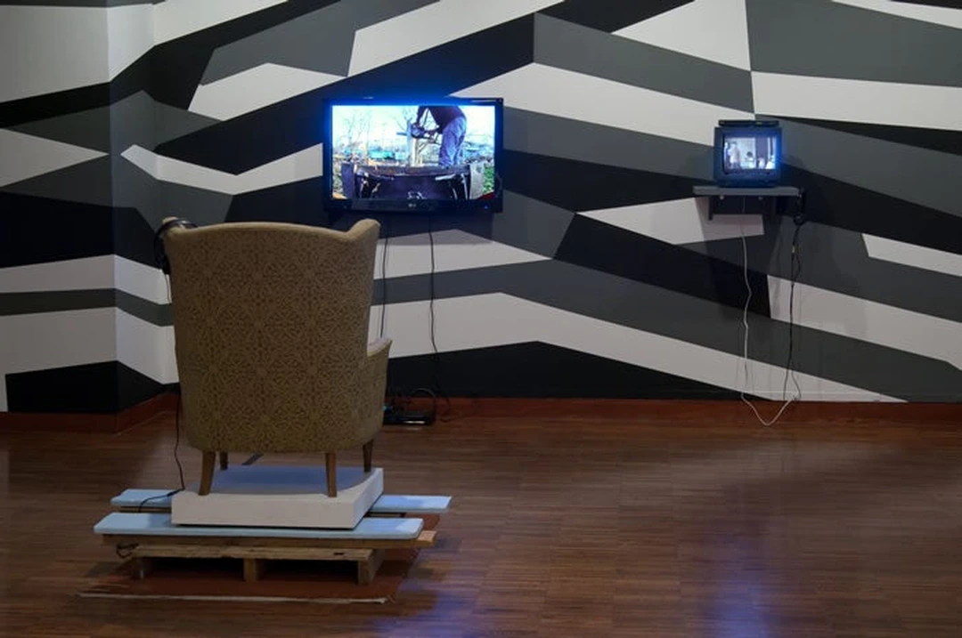 Design 99 (Mitch Cope and Gina Reichert), Total Benefit Solutions, 2011, video installation with geometric Razzle Dazzle paint scheme at the Weston Art Gallery.