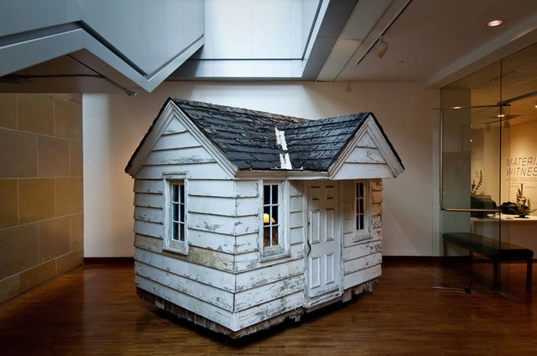 Peter Haberkorn, Pool House Flurries, 2011, salvaged children's clubhouse with swirling down feathers at the Weston Art Gallery.