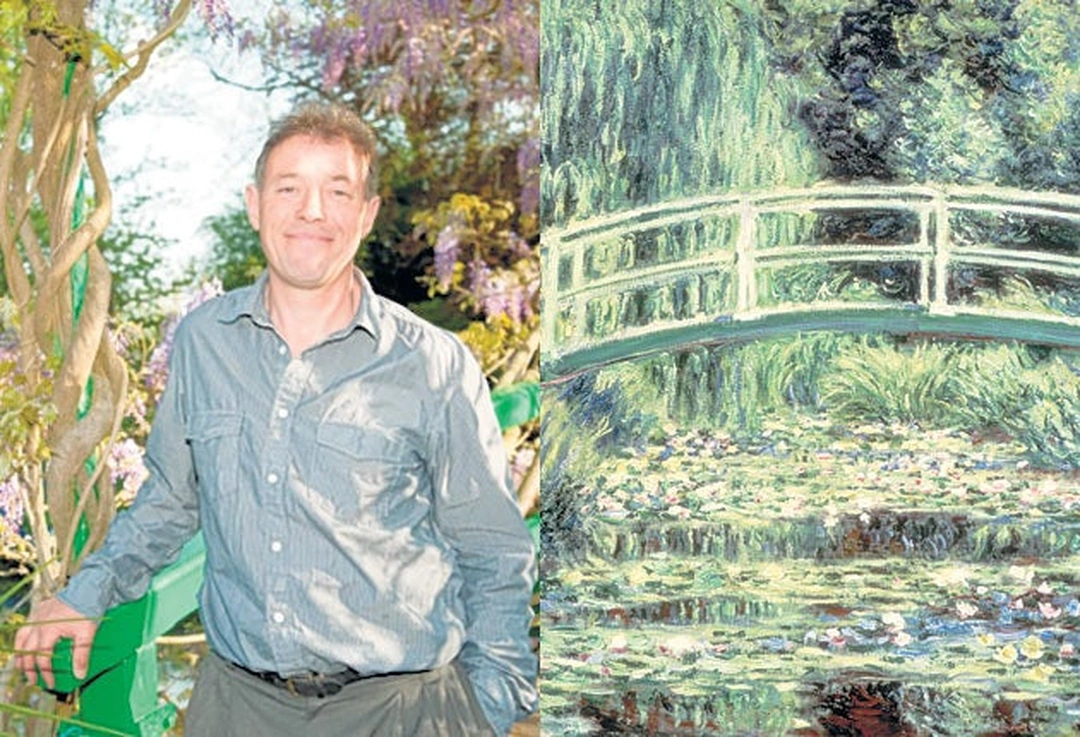 James Priest beside Claude Monet's Japanese bridge painting, 2011.