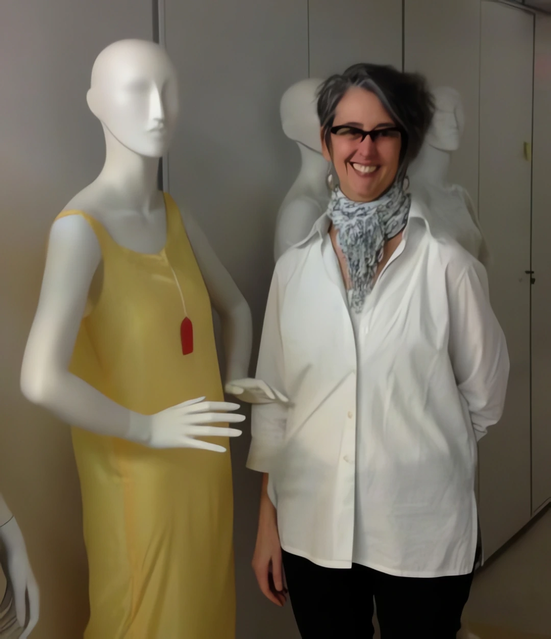Cynthia Amnéus in the Costume and Textile Department storage