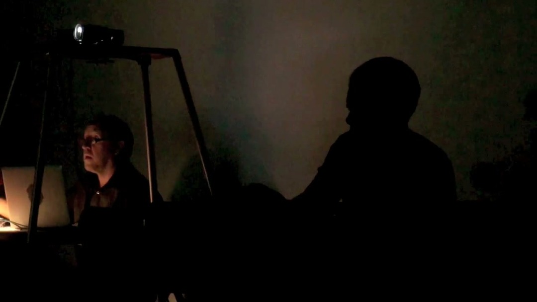 Charles Woodman with laptop and projector during the “Lateral Thinking” performance at Third Party Gallery, Cincinnati, September 8, 2012. Still from the performance documentation by the artist. (Related image located during this archive's reconstruction.)