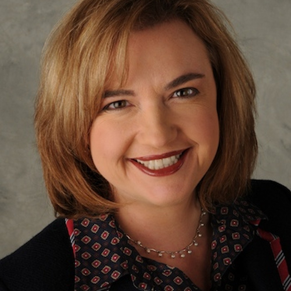 Close-up of Alecia Kintner’s smiling face.