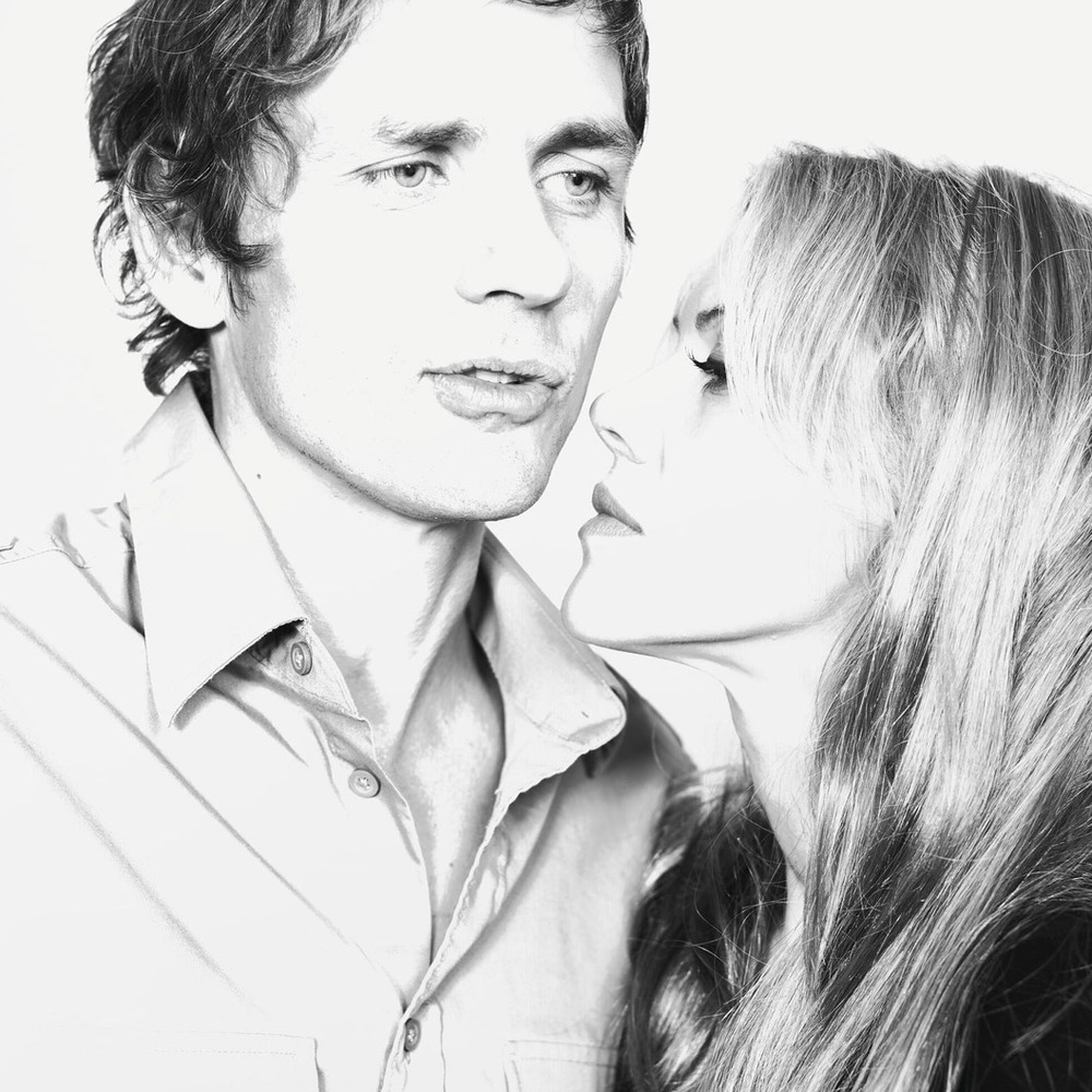 Dean Wareham and Britta Phillips, black-and-white portrait.