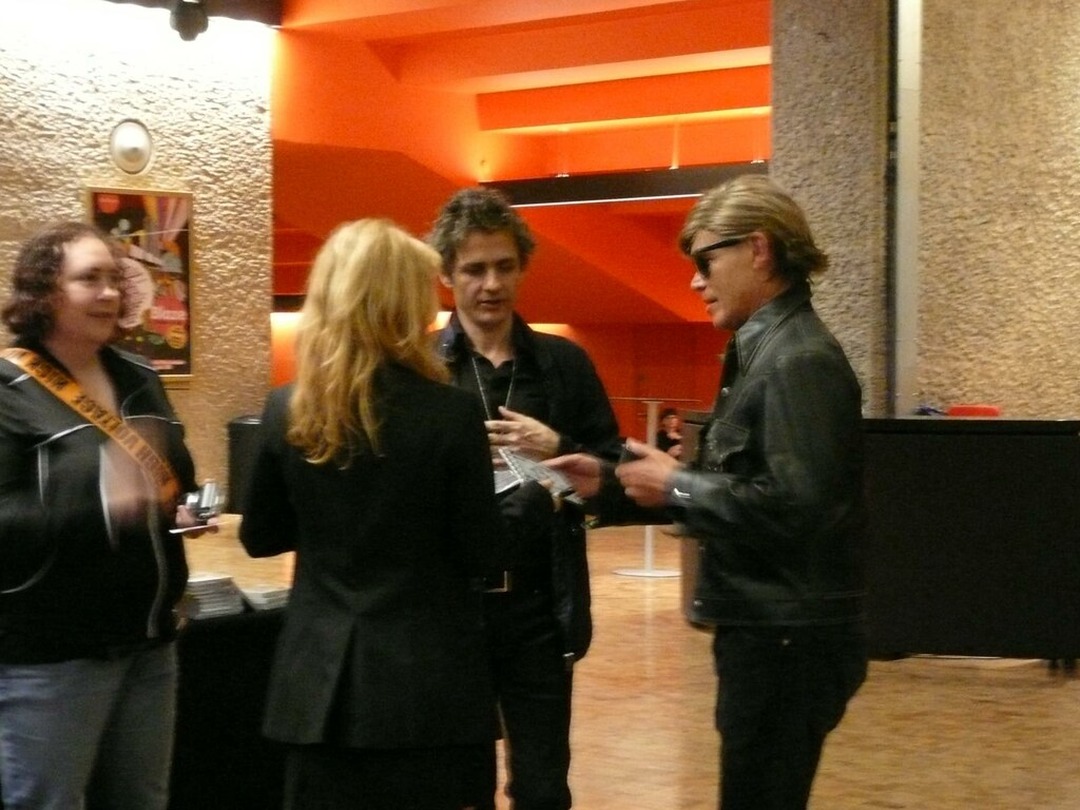 Dean Wareham signing autographs in the foyer of the Barbican Centre, London, 30 July 2010, during the 13 Most Beautiful tour. Photograph by grange85. (Related image located during this archive’s reconstruction.)