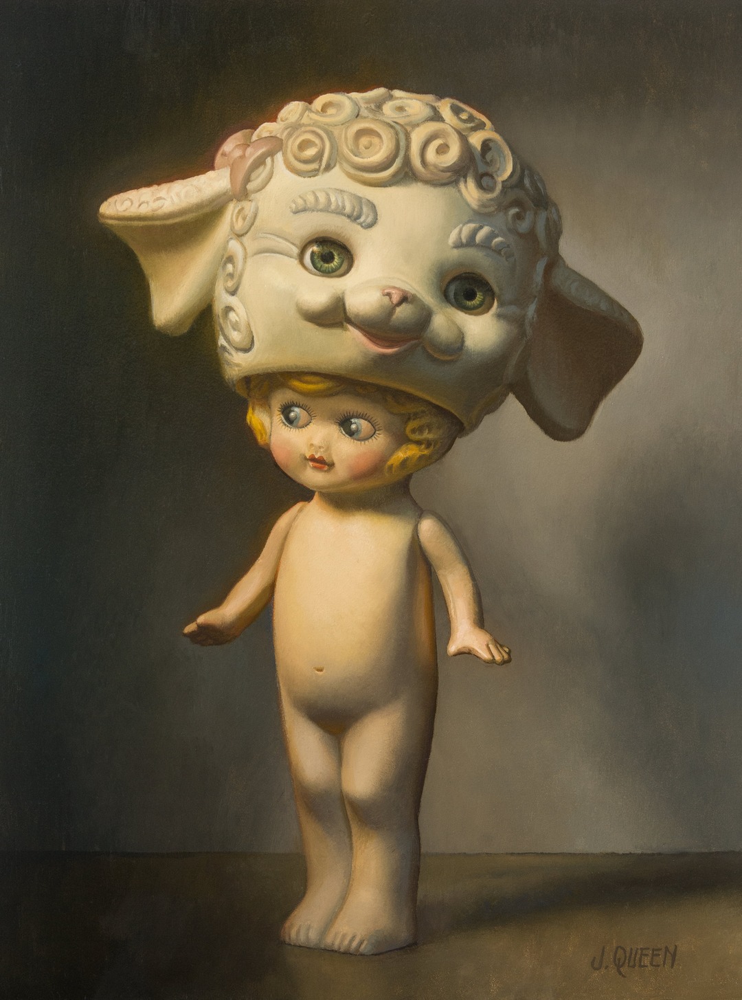 Doll wearing a lamb's-head helmet. Jonathan Queen, Double Minded.