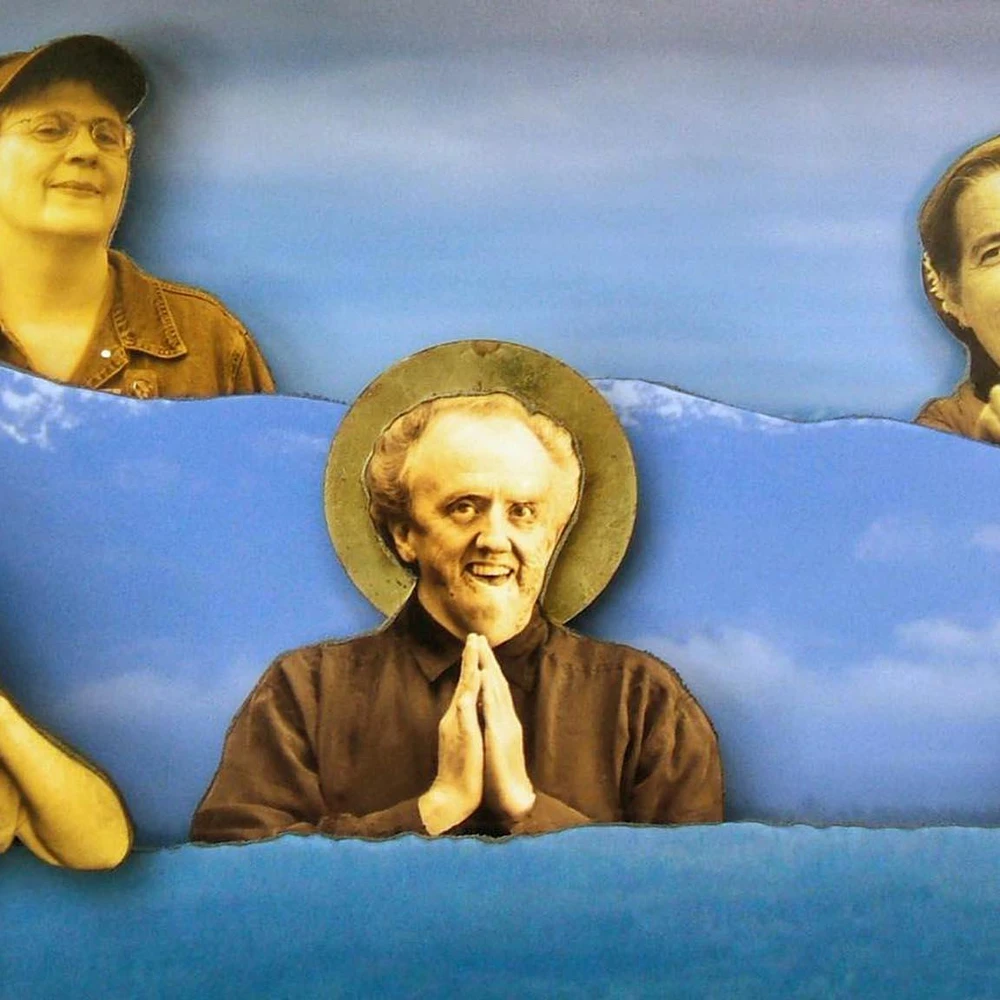 Still from Shameless: The Art of Disability: five people shown as cut-out portraits set among painted blue waves and sky, with a smiling man in the center pressing his palms together beneath a golden halo.