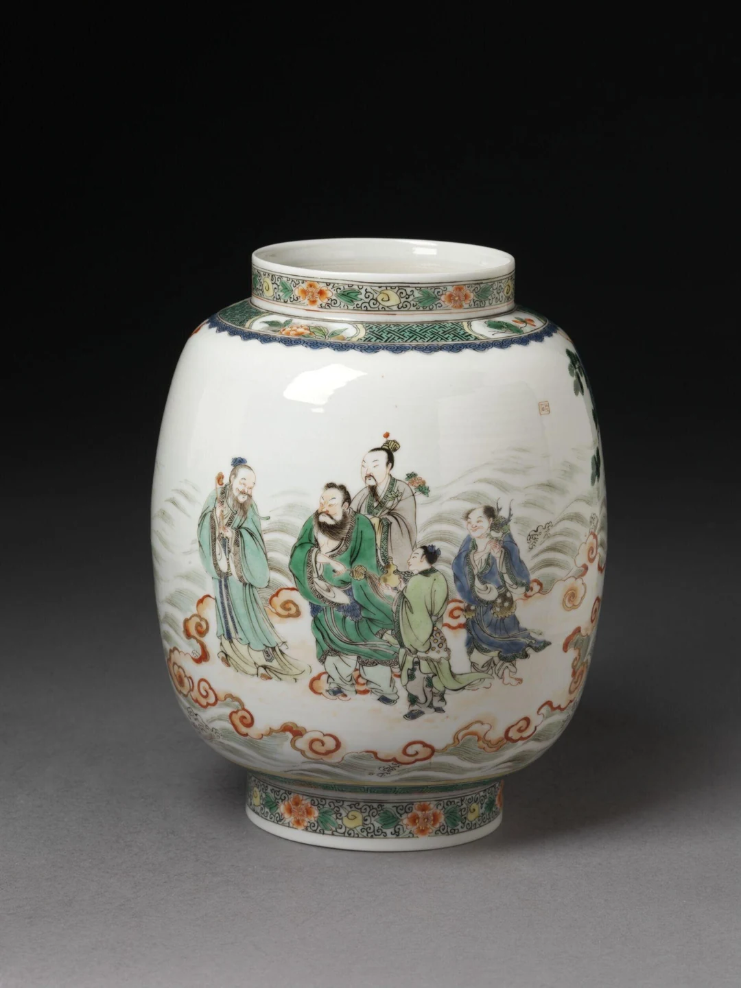 White porcelain lantern with short neck and foot, painted in green, red and blue famille verte enamels with five Daoist immortals standing among waves and clouds; floral bands decorate the neck and foot. Chinese, Lantern with Daoist Immortals, Kangxi period (1662–1722), 20.3 cm. Image from Victoria and Albert Museum. (Related image located during this archive's reconstruction.)