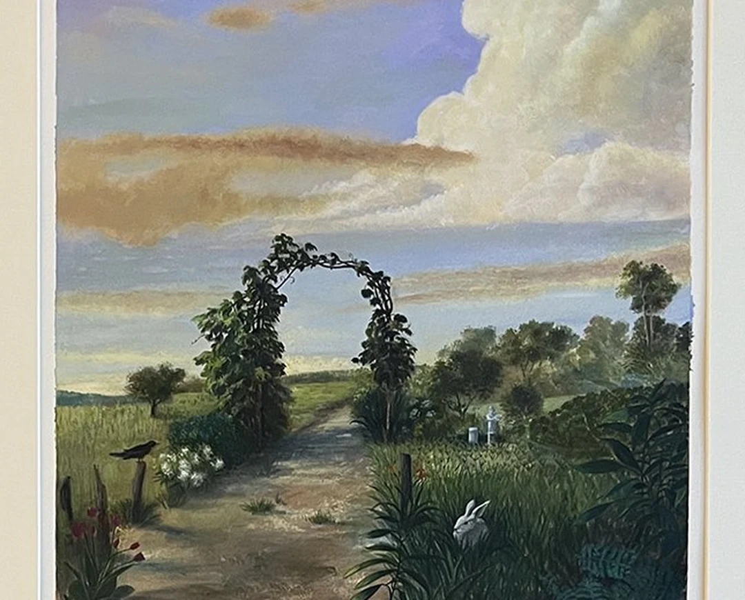 A garden path through a leafy arch with a rabbit.