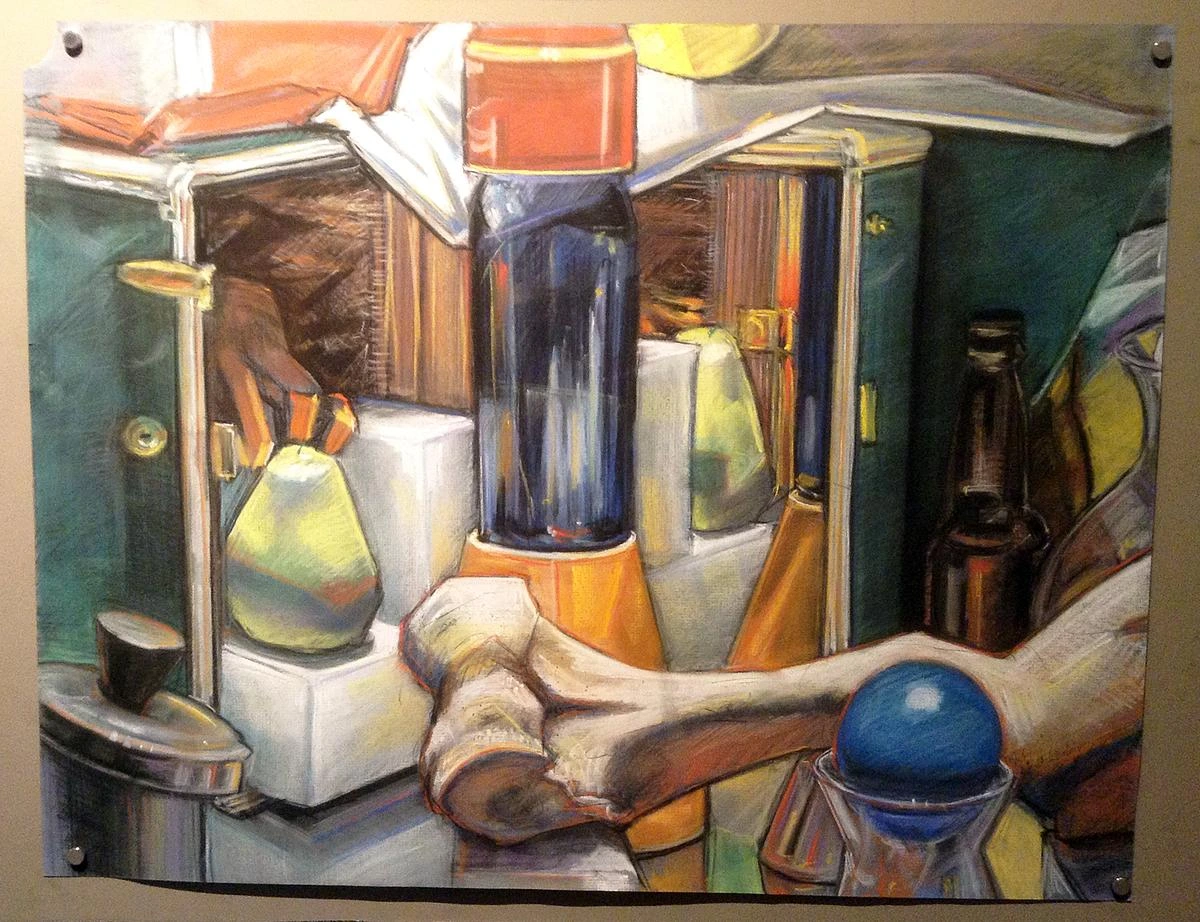 Still life drawing by Shelby Shadwell in pastel: bottles, a pear, white boxes, a bone-like white form and a blue sphere crowded together, the sheet pinned to a wall.