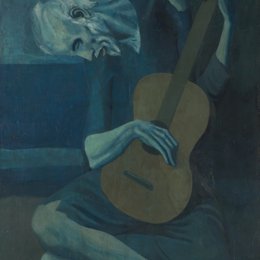 Oil painting by Pablo Picasso showing an emaciated old man in blue tones hunched over his guitar. Pablo Picasso, The Old Guitarist, late 1903–early 1904.