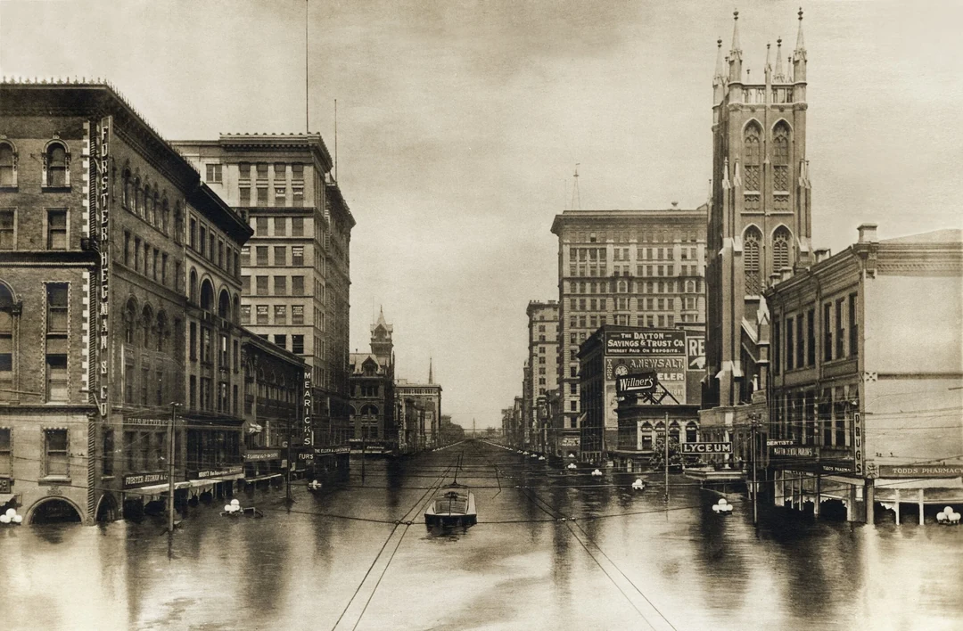 Flooded Main Street with a church on the right, water covering the roadway. Image from Andy Snow's website.