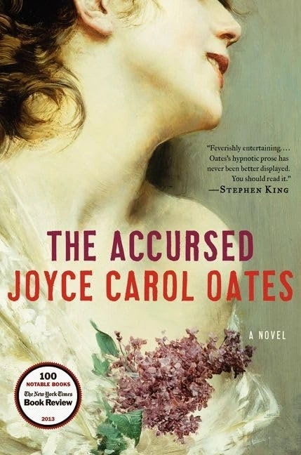 Cover of The Accursed by Joyce Carol Oates: a woman in profile with her head tilted back, holding a sprig of lilac, with the title in red letters.