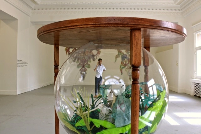 Johnston Foster, Islands of Time, 2013, with independent curator Aaron Michael Skolnick. Photograph by Louis Zoellar Bickett.