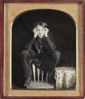 Young Man On Chair Back