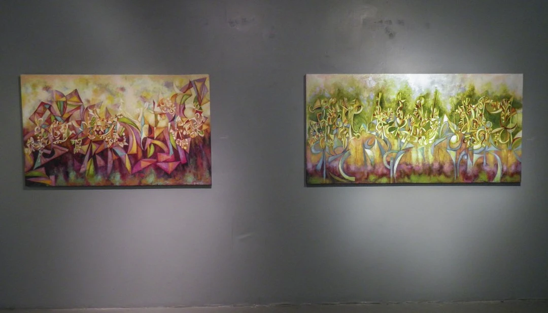 Two large colorful abstract paintings on a gray gallery wall. Photograph by Cedric Cox.