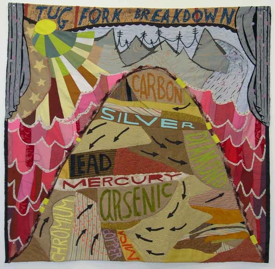 Colorful quilt with stitched words including Tug Fork Breakdown, Carbon, Silver, Lead, Mercury, Arsenic and Chromium.
