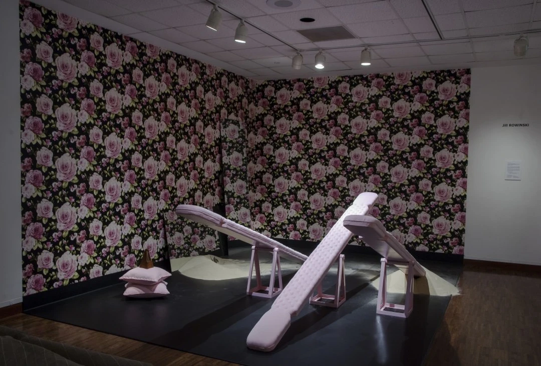 Jill Rowinski, Today, Tomorrow, the Day after Tomorrow, 2013: installation with floral wallpaper and pink slides.