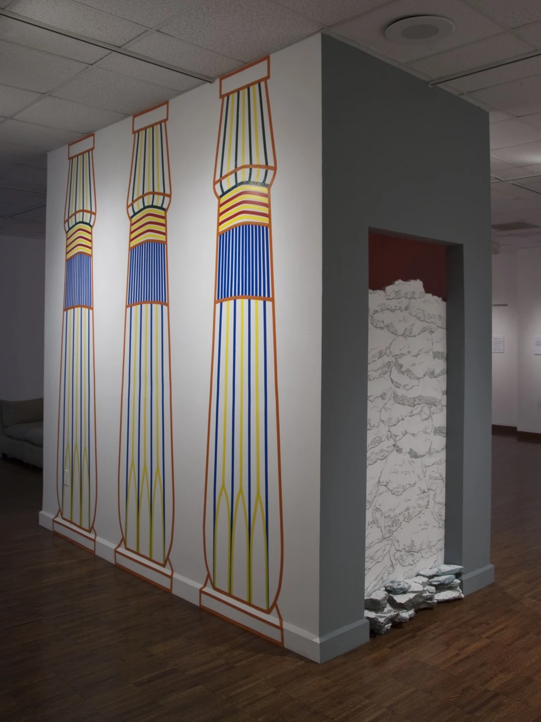 Stewart Goldman, The Last Act, 2013: wall with three tall striped columns and a doorway.