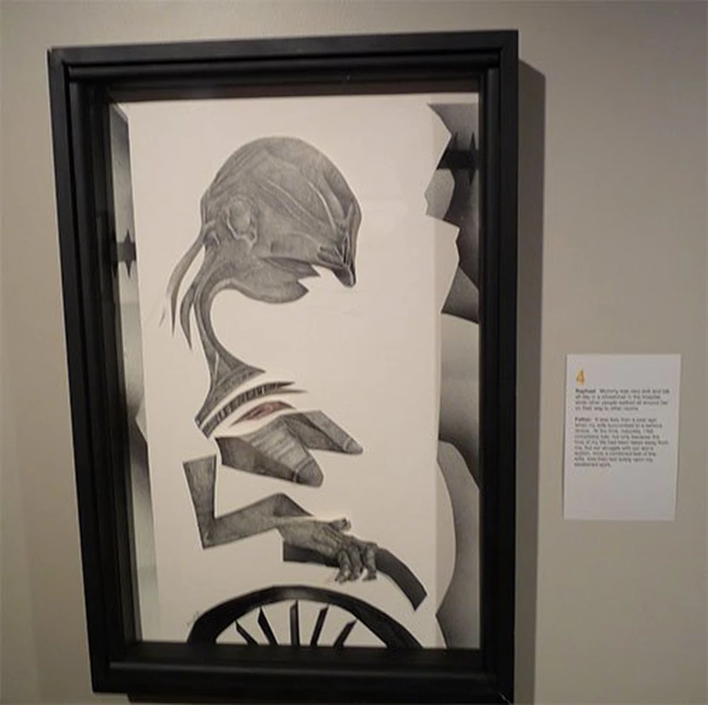 Framed black-and-white drawing of an abstract figure.
