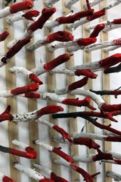 Detail of Saad Ghosn's The Price of a Civil War, acrylic paint with sticks and wood