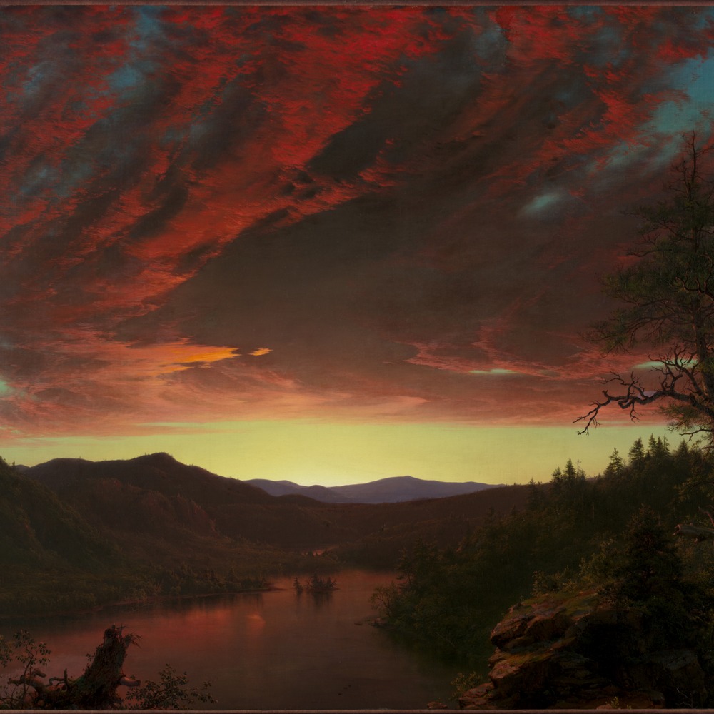 Twilight in the Wilderness by Frederic Edwin Church: dramatic red and orange clouds over a mountain lake at sunset, dark trees framing the view on both sides