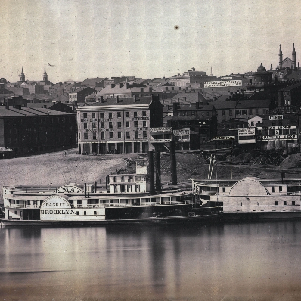 Section of the 1848 daguerreotype panorama of Cincinnati: the steamboats Brooklyn and Ama moored at the Public Landing below brick warehouses and church spires.