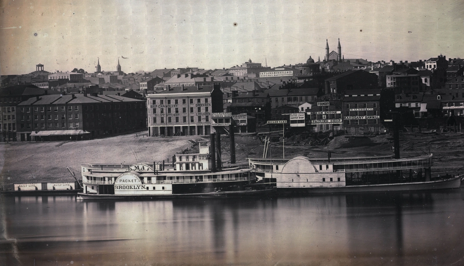 Section of the 1848 daguerreotype panorama of Cincinnati: the steamboats Brooklyn and Ama moored at the Public Landing below brick warehouses and church spires.