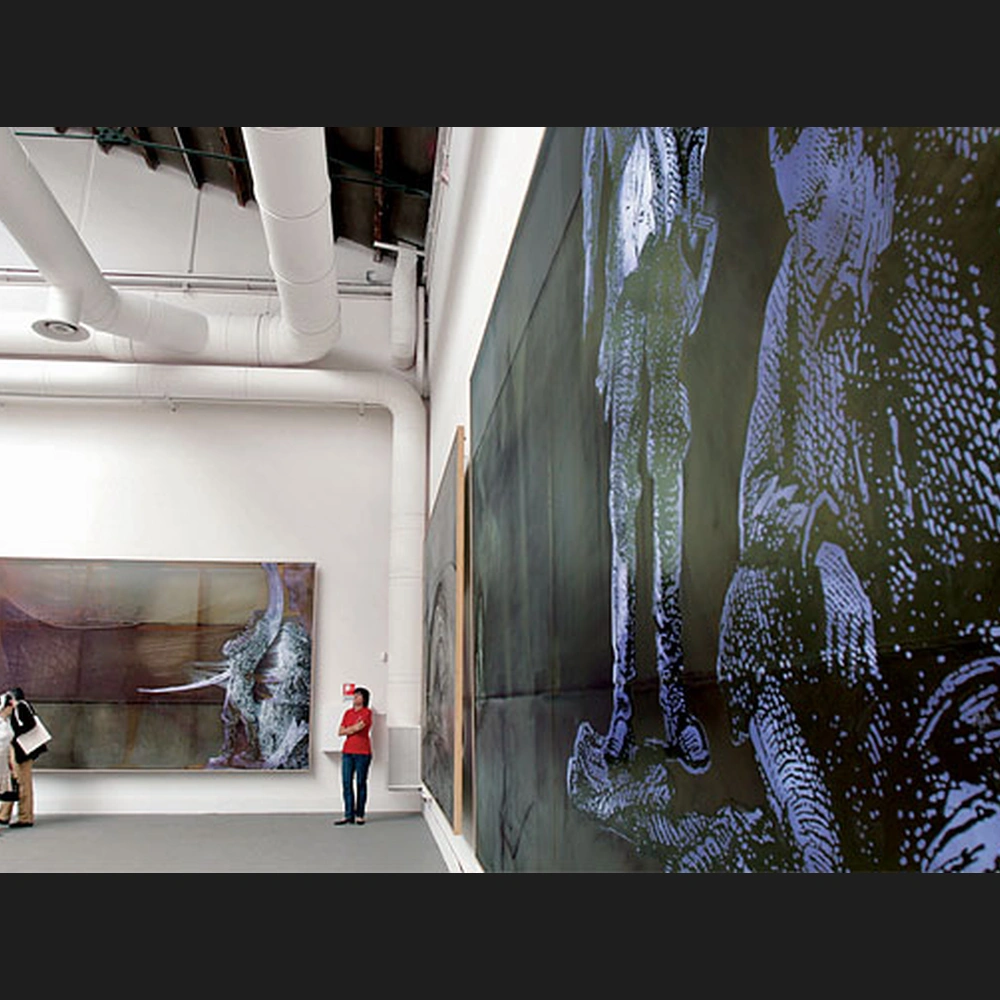 Exhibition view of Sigmar Polke's 2007 Venice Biennale installation: large paintings on white gallery walls, with visitors looking at a wide dark-toned work on the left.