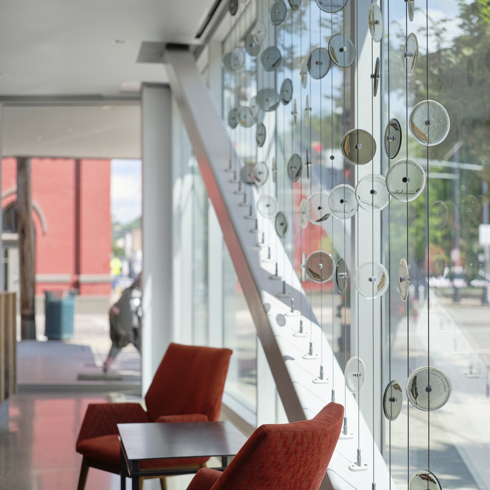 Hanging glass discs at Brazee Street Studios