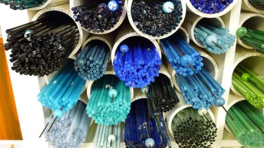 Bundles of colorful glass rods in tubes