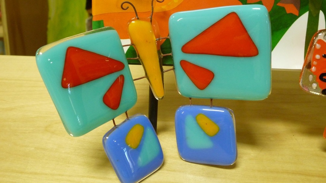 Fused glass butterfly with turquoise, red and yellow glass