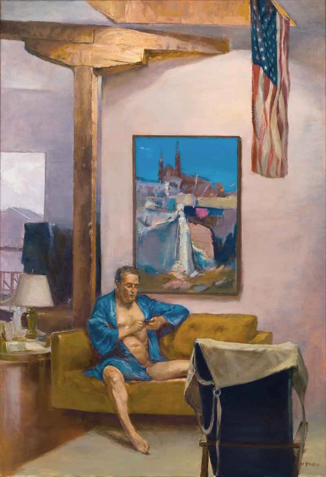 Oil painting of a sunlit studio interior under a skylight: a man in a blue robe sits on a mustard-yellow sofa beneath a framed cityscape painting, with an American flag hanging beside him.