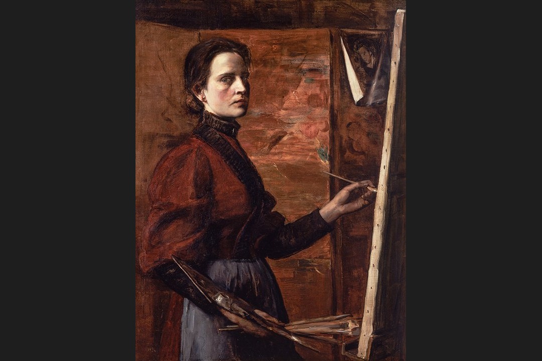Self-portrait of Elizabeth Nourse at her easel, holding a brush and palette, gazing at the viewer.