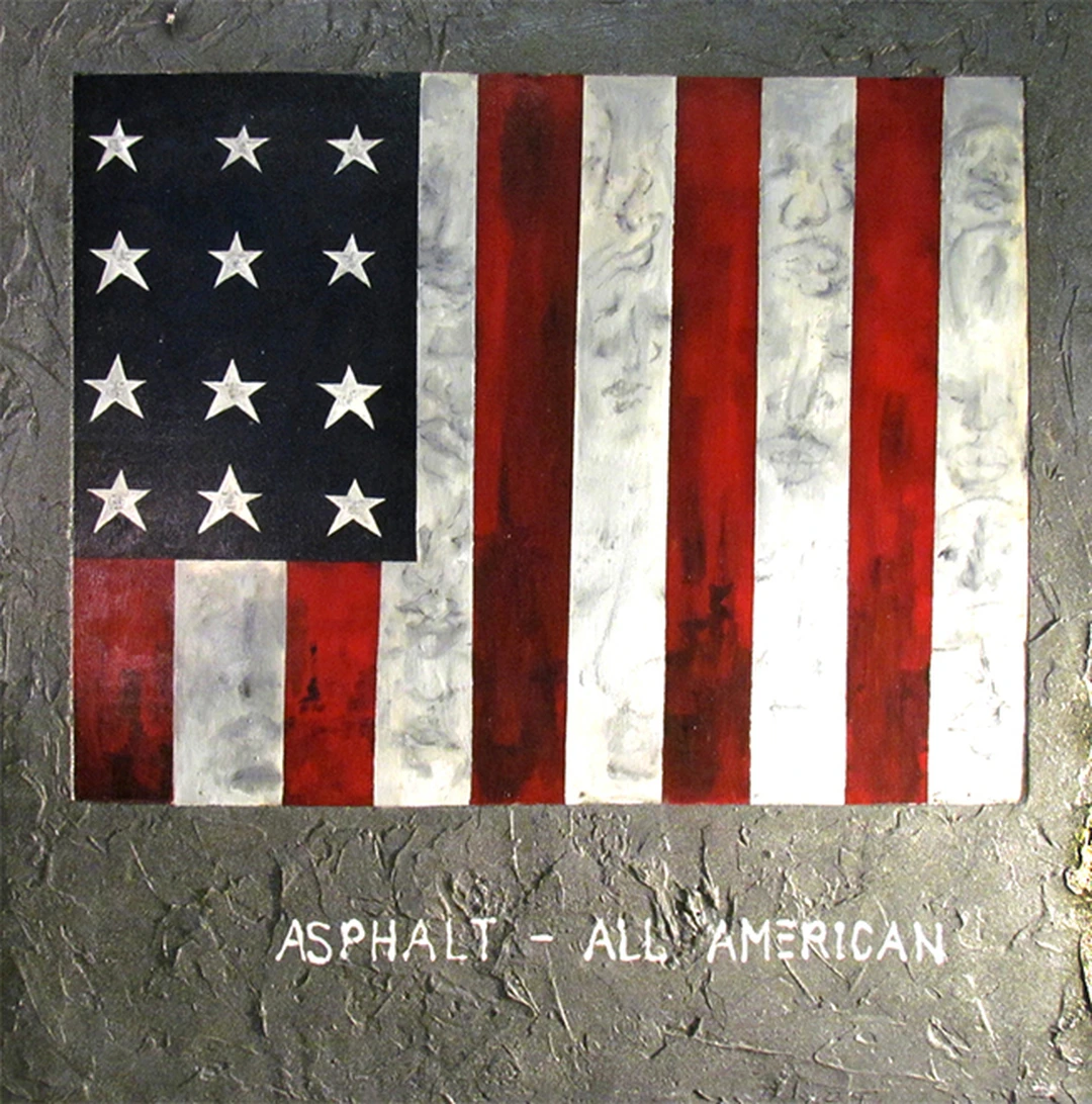 Painting of an American flag on a gray textured ground, with the words “ASPHALT – ALL AMERICAN” at the bottom.