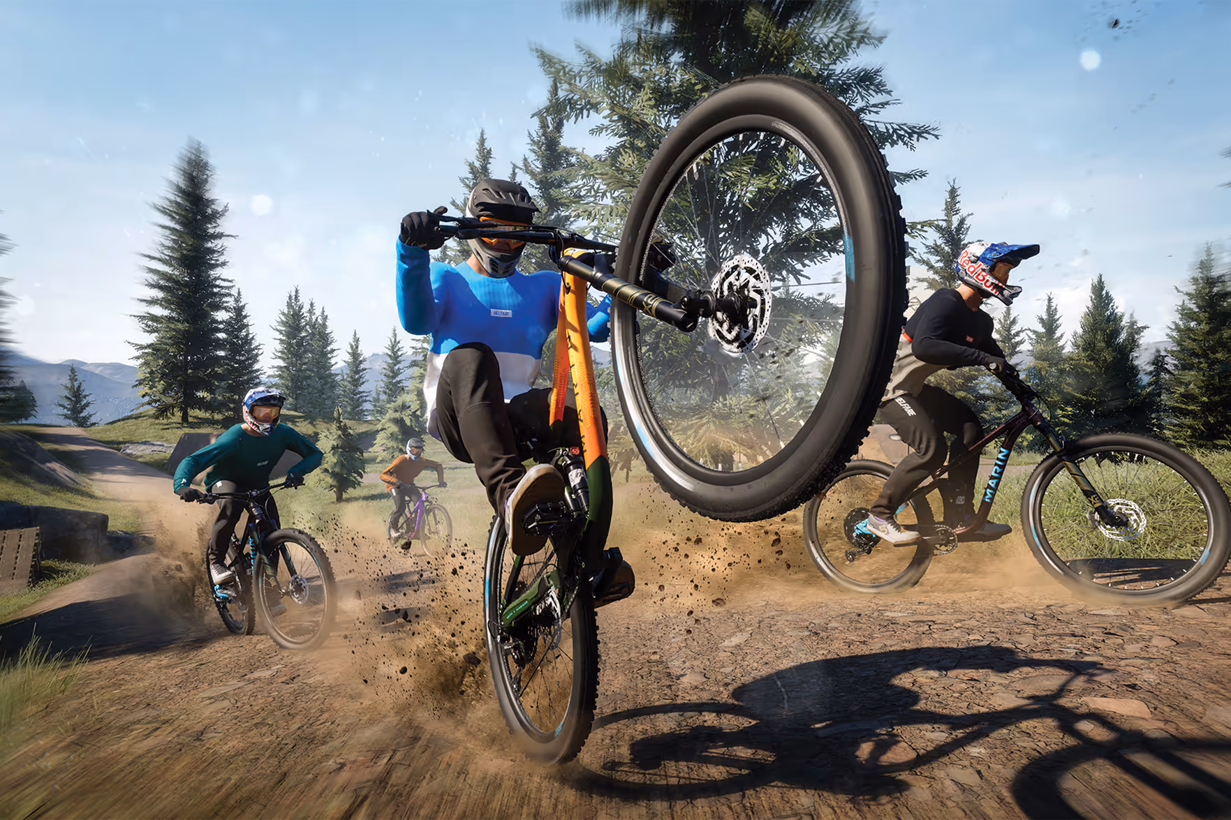 Group of mountain bikers riding together through scenic mountain terrain