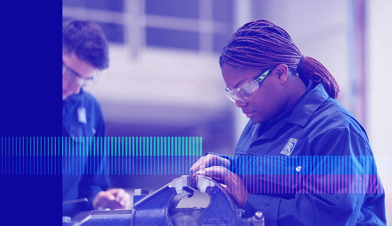 Styled image of a female Rolls Royce engineer wearing goggles and working on an engine part.