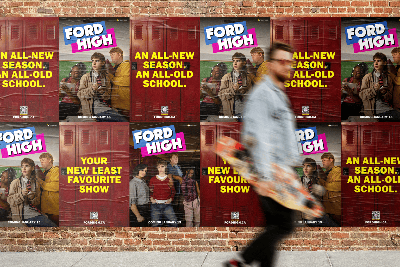 Brick wall covered in repeated posters for the show 'Ford High' featuring students by red lockers and text about the new season launching January 15, with a blurred person walking by holding a skateboard.