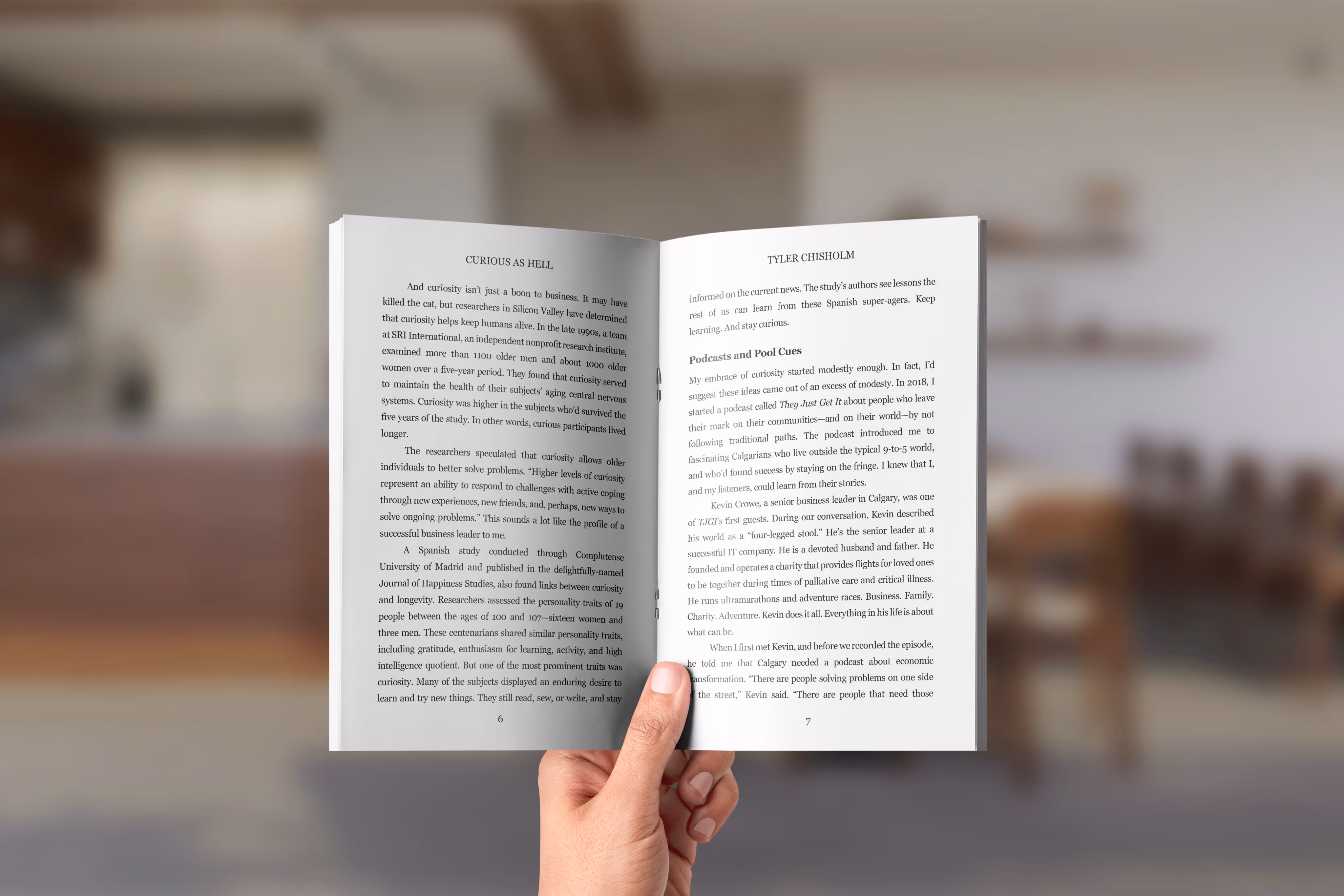 Hand holding Curious as Hell book open