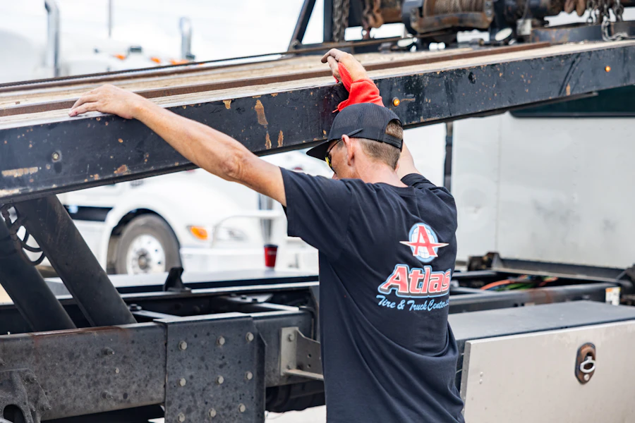 Atlas's team member in repair shop in Houston, TX