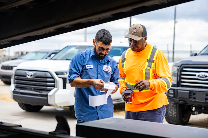 Atlas's team in truck repair shop in Houston, TX