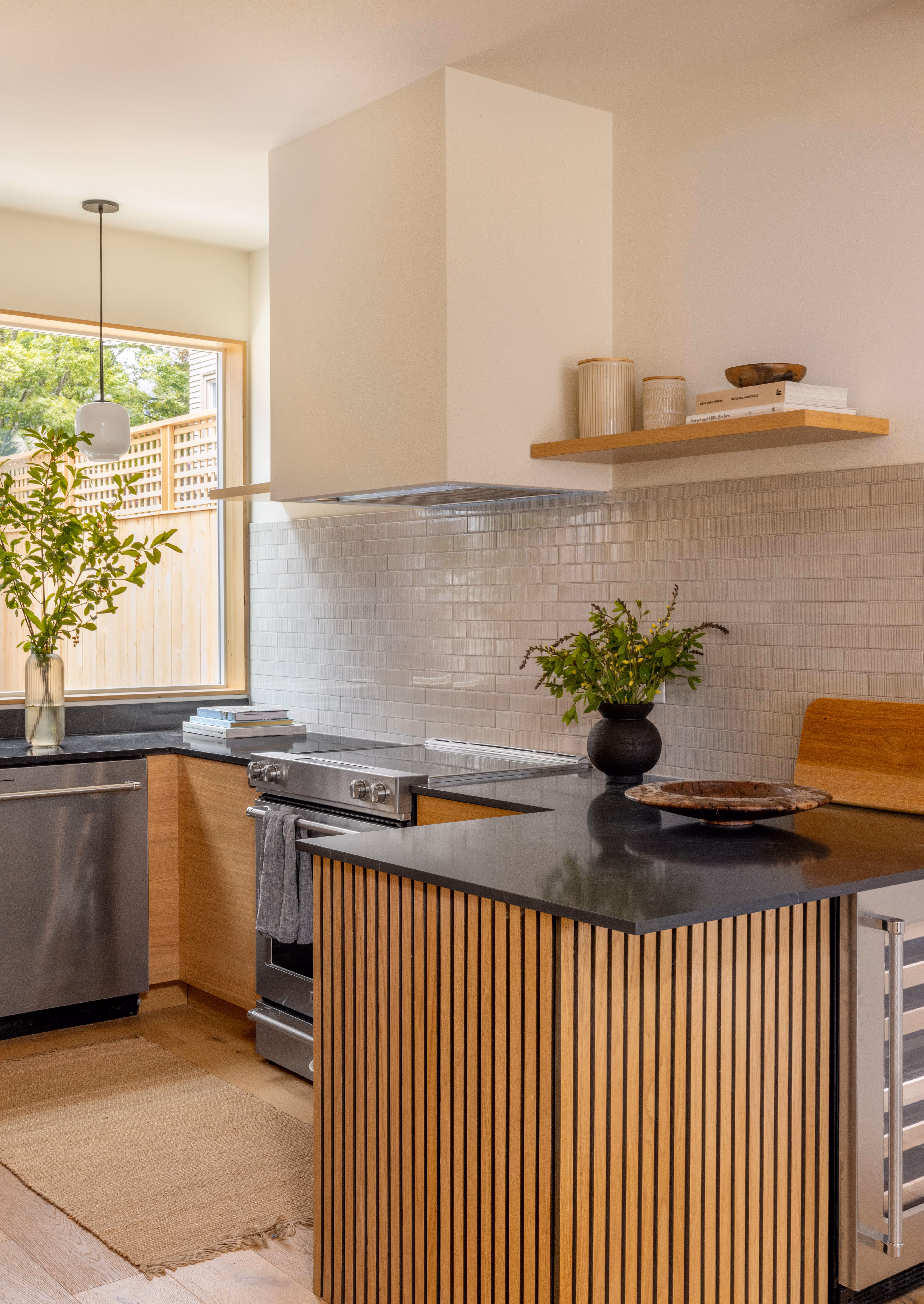 Modern elegant kitchen with stainless steel appliances